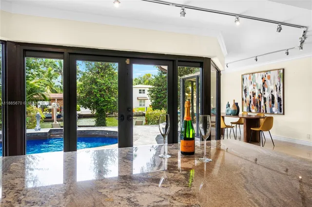 a view of living room filled with furniture