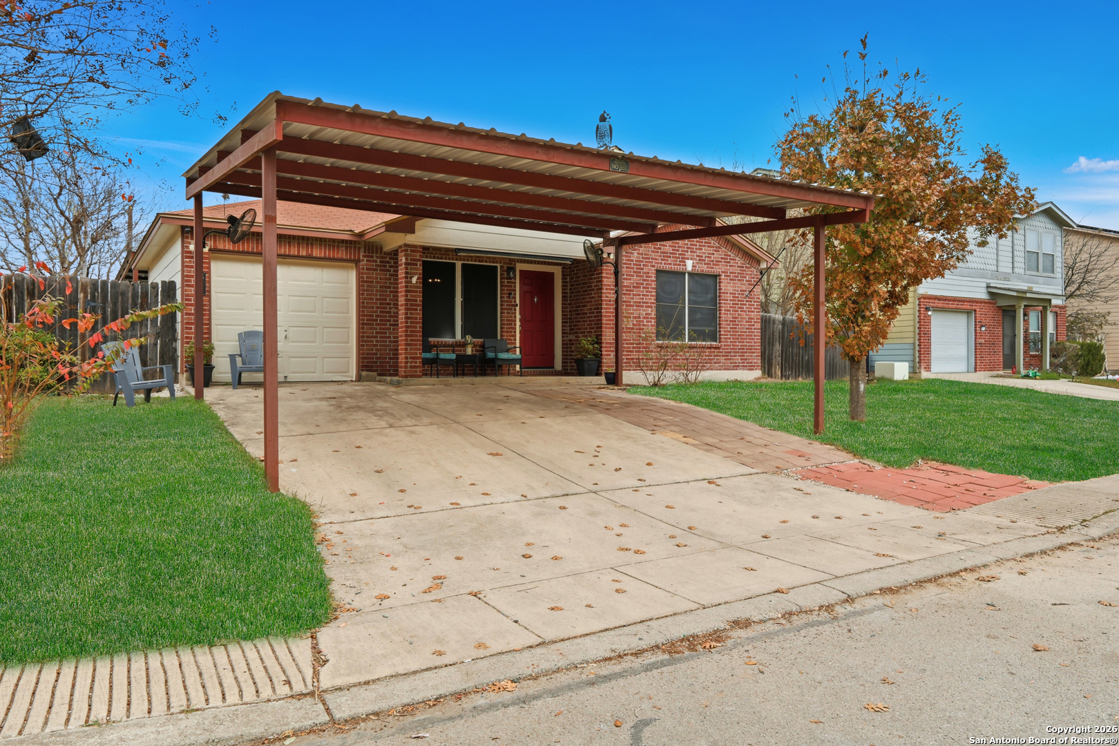 814 Inks Farm San Antonio, TX 78228 - Photo 7 of 32 front view of a house with a yard