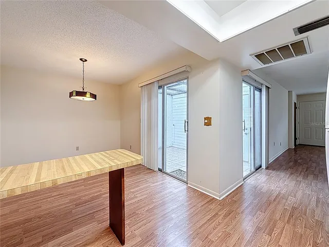 a hallway with wooden floor