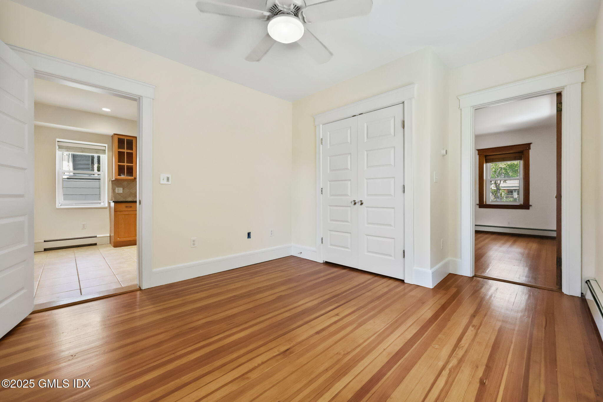20 Church St W Greenwich, CT 06830 - Photo 15 of 31 an empty room with wooden floor and closet