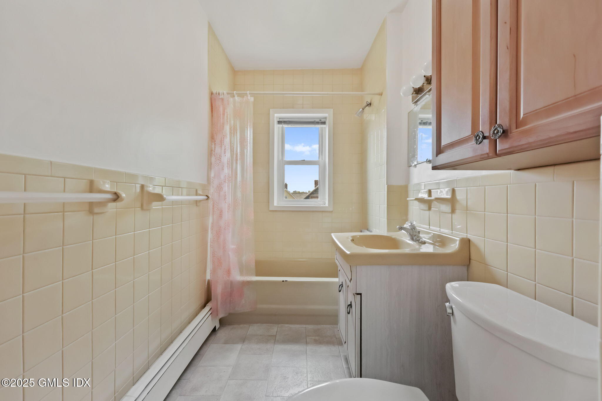 20 Church St W Greenwich, CT 06830 - Photo 22 of 31 a bathroom with a sink toilet and shower