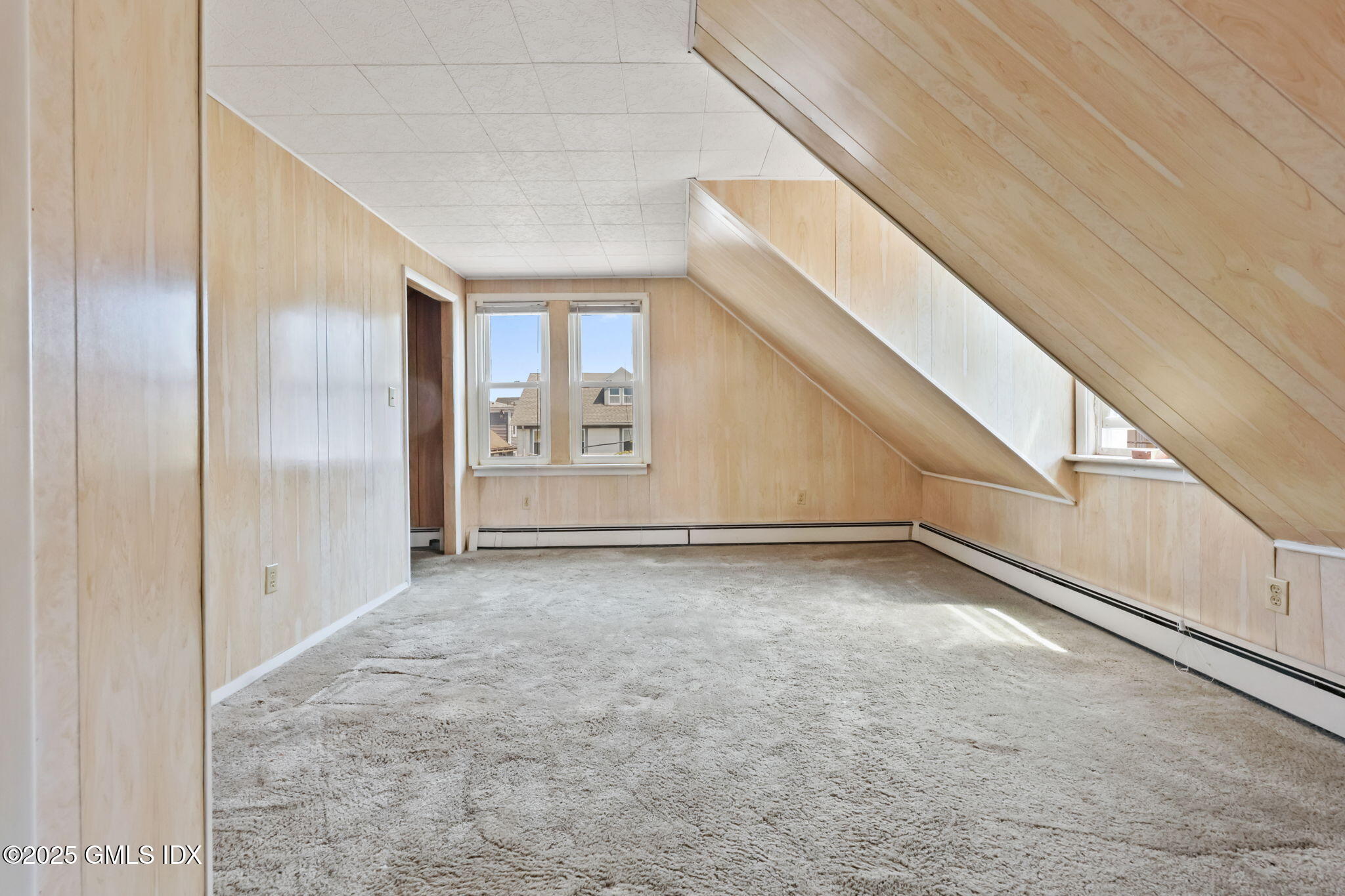 20 Church St W Greenwich, CT 06830 - Photo 24 of 31 a view of an empty room with windows