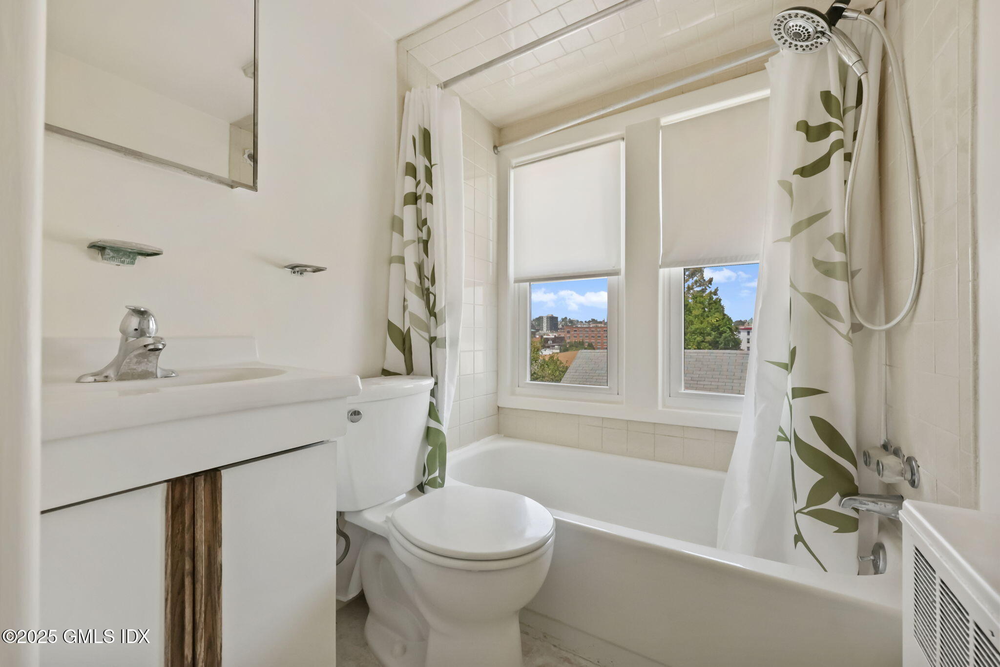 20 Church St W Greenwich, CT 06830 - Photo 27 of 31 a bathroom with a sink a toilet and a bathtub