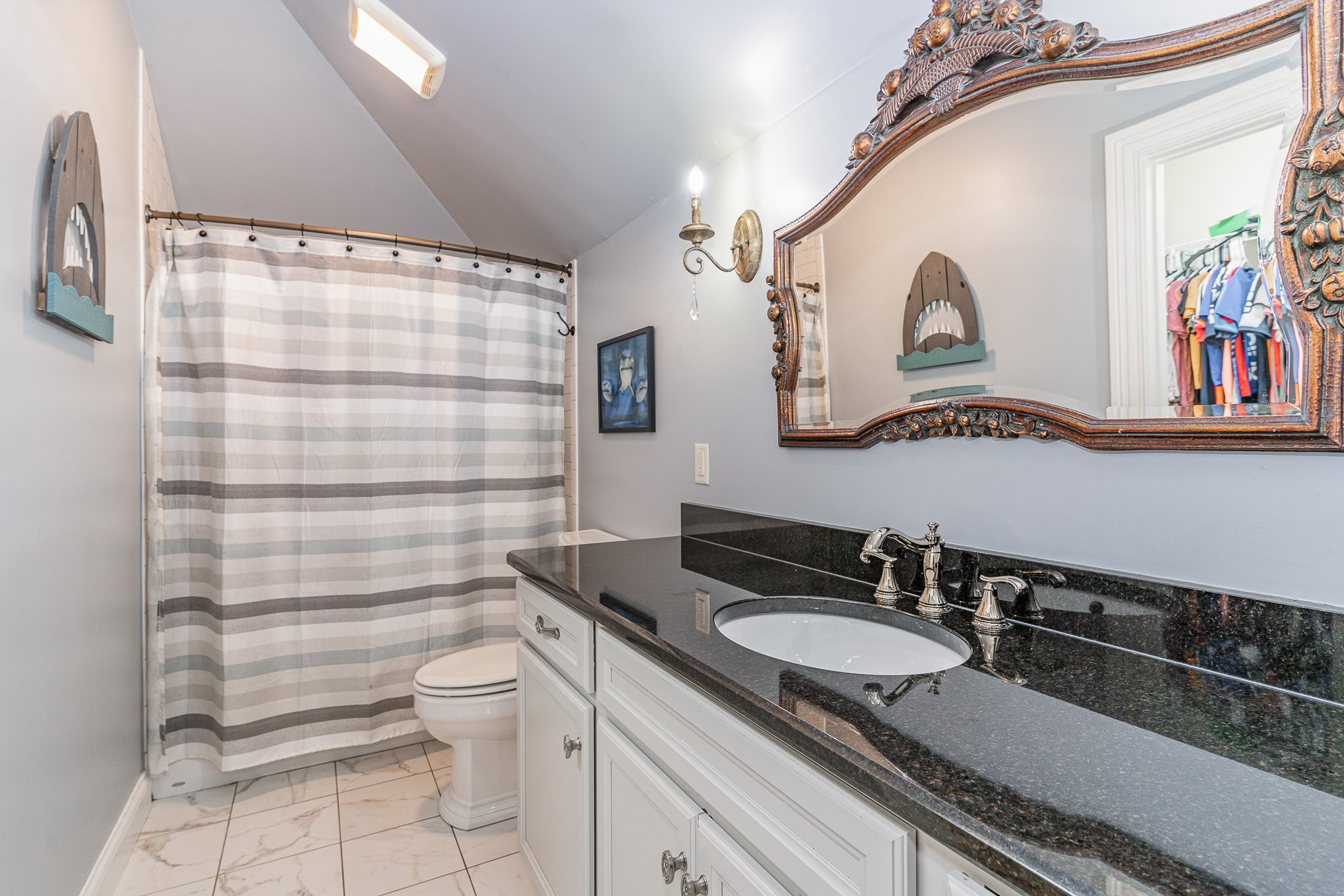 4289 Peytonsville-Trinity Road Franklin, TN 37064 - Photo 42 of 67 a bathroom with a sink a toilet and a mirror