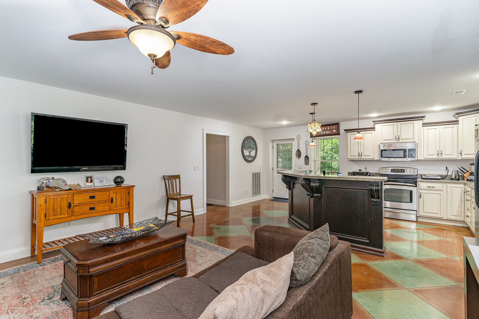 4289 Peytonsville-Trinity Road Franklin, TN 37064 - Photo 49 of 67 a living room with furniture and a flat screen tv