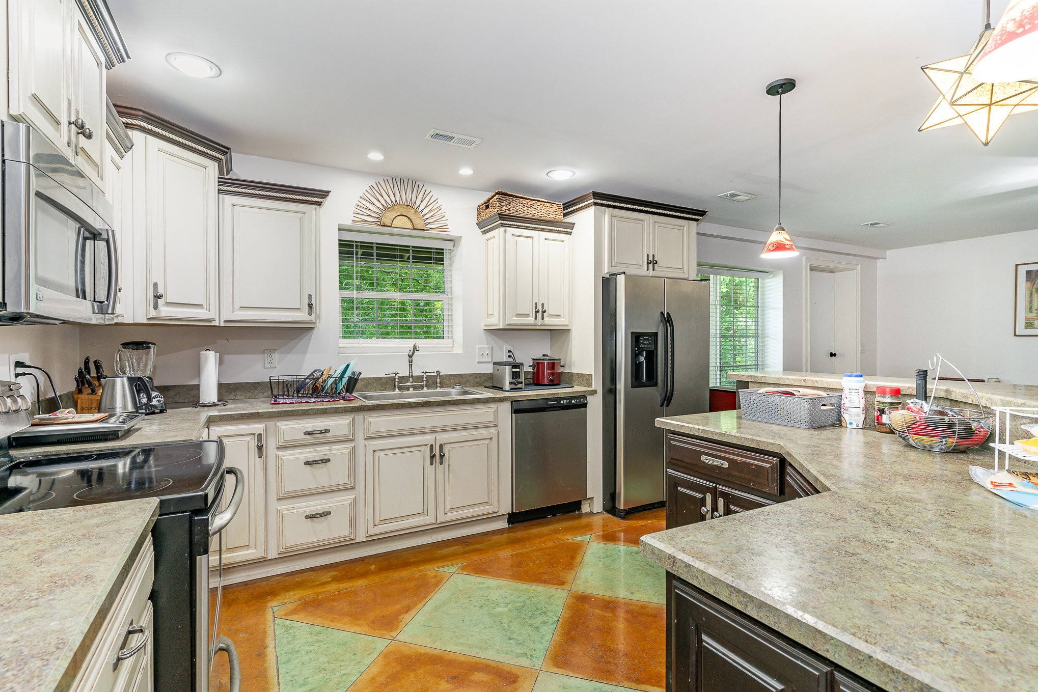 4289 Peytonsville-Trinity Road Franklin, TN 37064 - Photo 50 of 67 a kitchen with stainless steel appliances granite countertop a sink stove and refrigerator