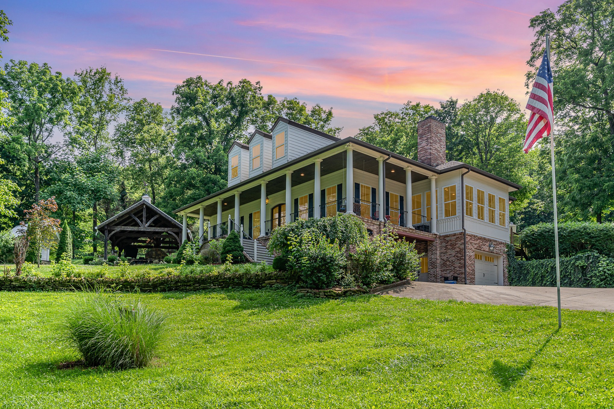 4289 Peytonsville-Trinity Road Franklin, TN 37064 - Photo 56 of 67 a front view of a house with a yard table and chairs