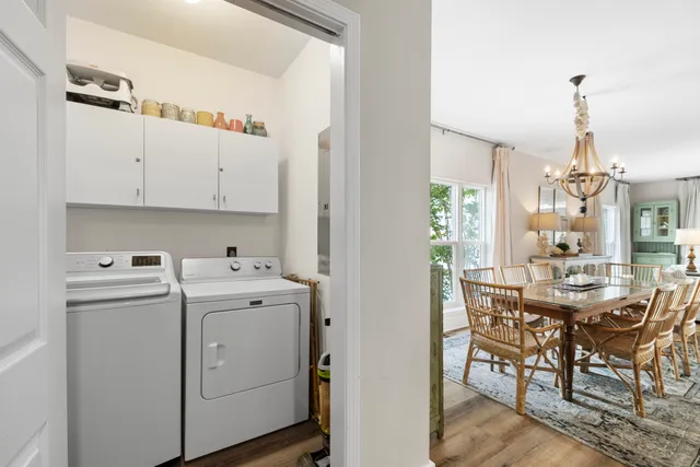 a view of a kitchen and utility room