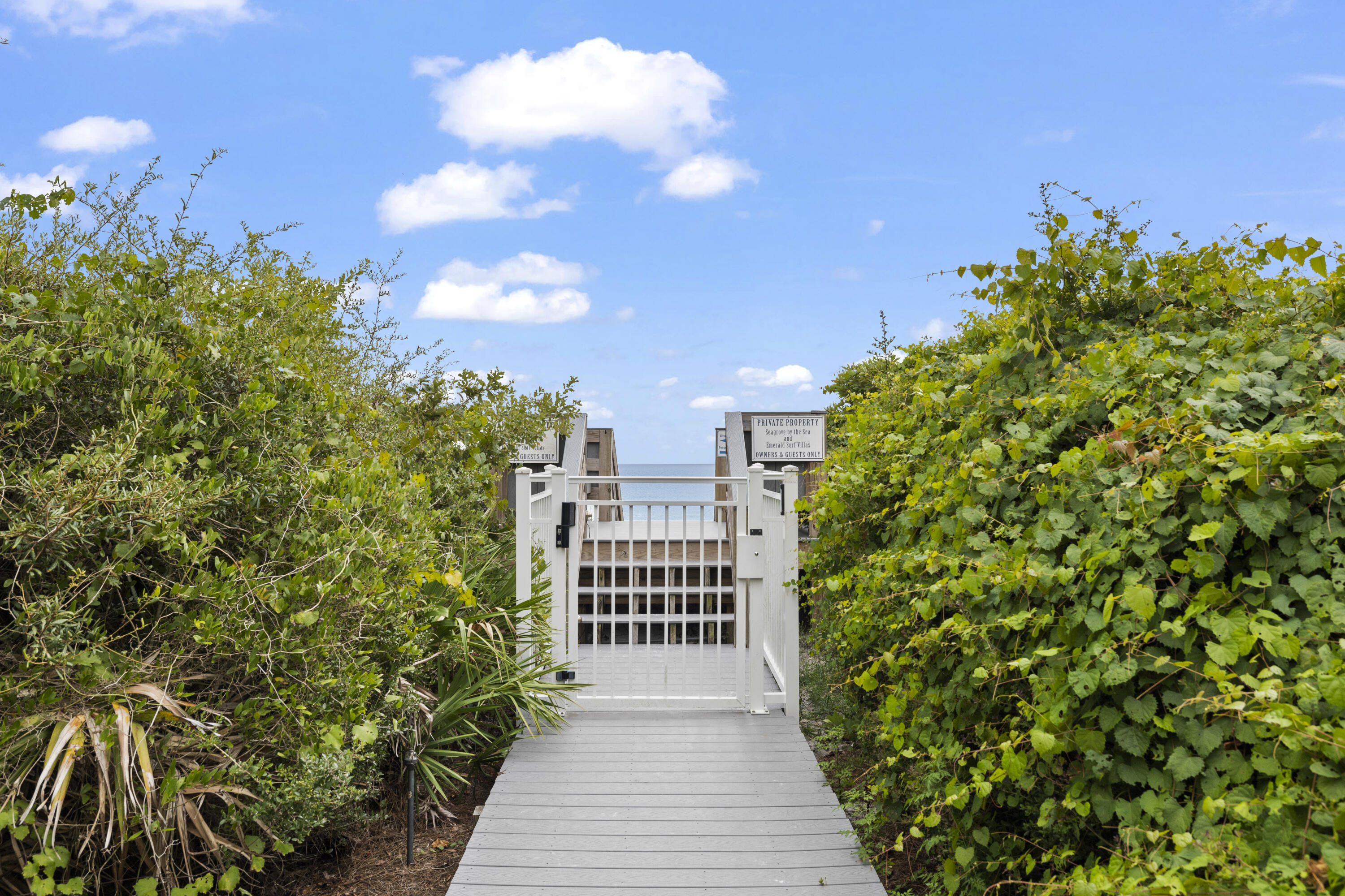4192 East County Highway 30A, Unit A Santa Rosa Beach, FL 32459 - Photo 28 of 30 a view of a balcony with wooden fence