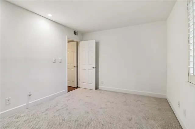 an empty room with an entryway