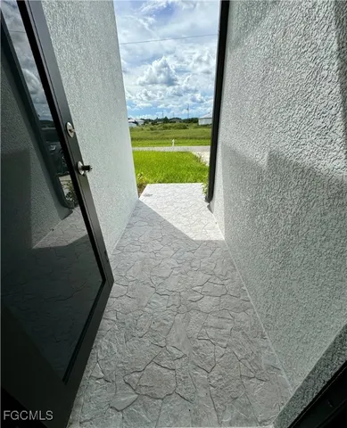 a view of swimming pool from a window
