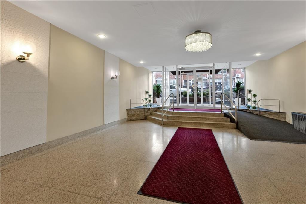 2155 82nd Street, Unit 3J Brooklyn, NY 11214 - Photo 4 of 15 a swimming pool view with seating space and chandelier