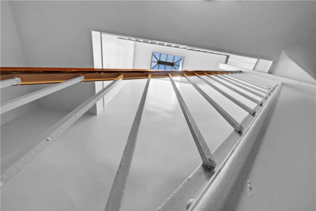 151 Kane Street Brooklyn, NY 11201 - Photo 5 of 14 a view of bed and wooden floor