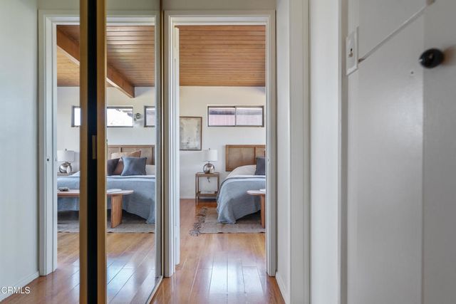 a view of a bedroom from a hallway