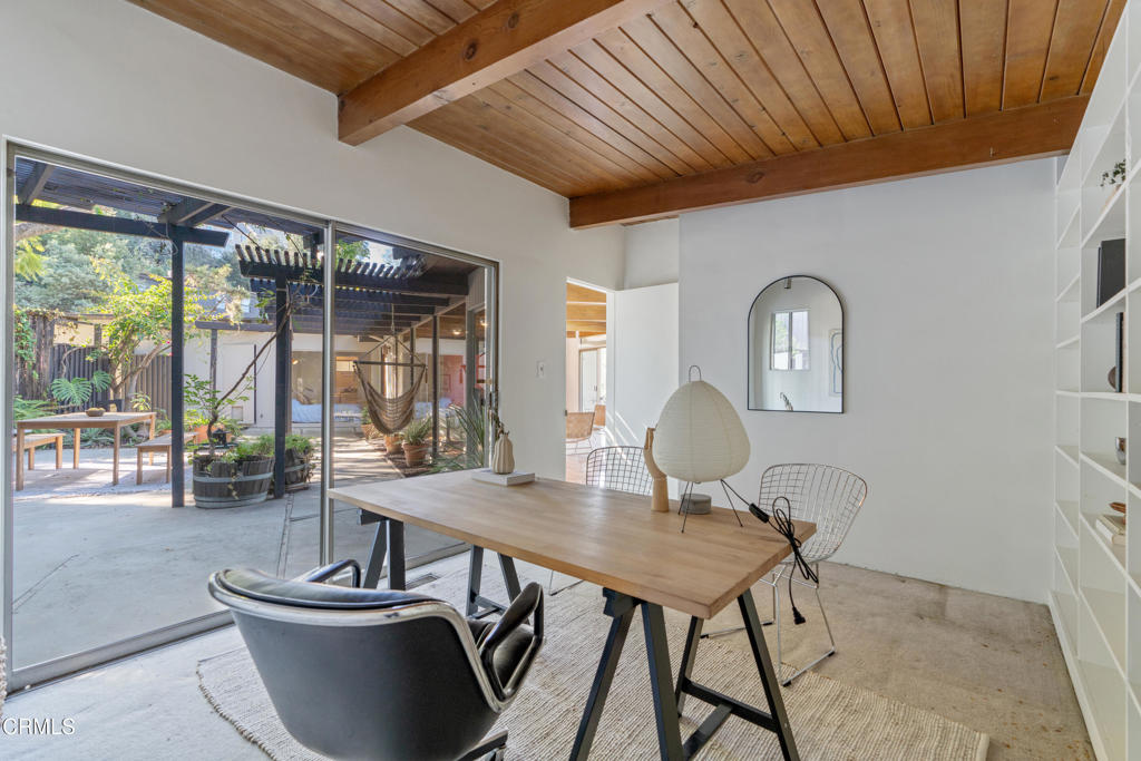 1959 Lucile Avenue Los Angeles, CA 90039 - Photo 29 of 49 a view of a dining room with furniture window and outside view