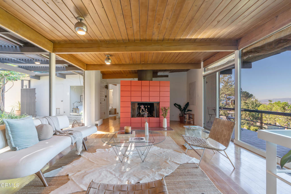 1959 Lucile Avenue Los Angeles, CA 90039 - Photo 6 of 49 a living room with furniture and a large window