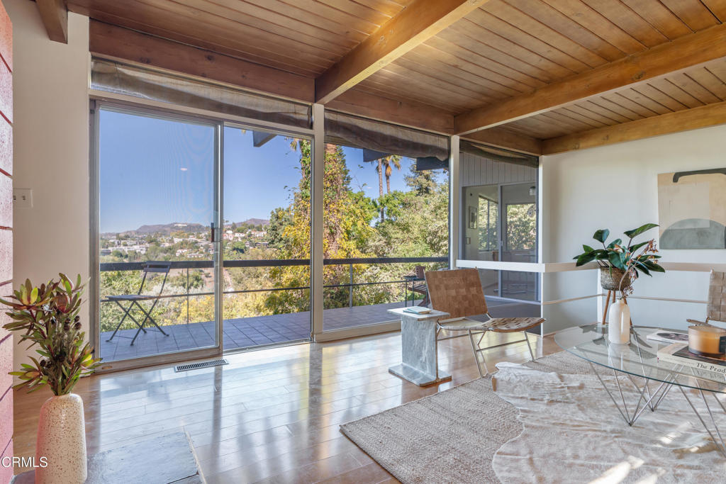 1959 Lucile Avenue Los Angeles, CA 90039 - Photo 9 of 49 a view of a porch with furniture