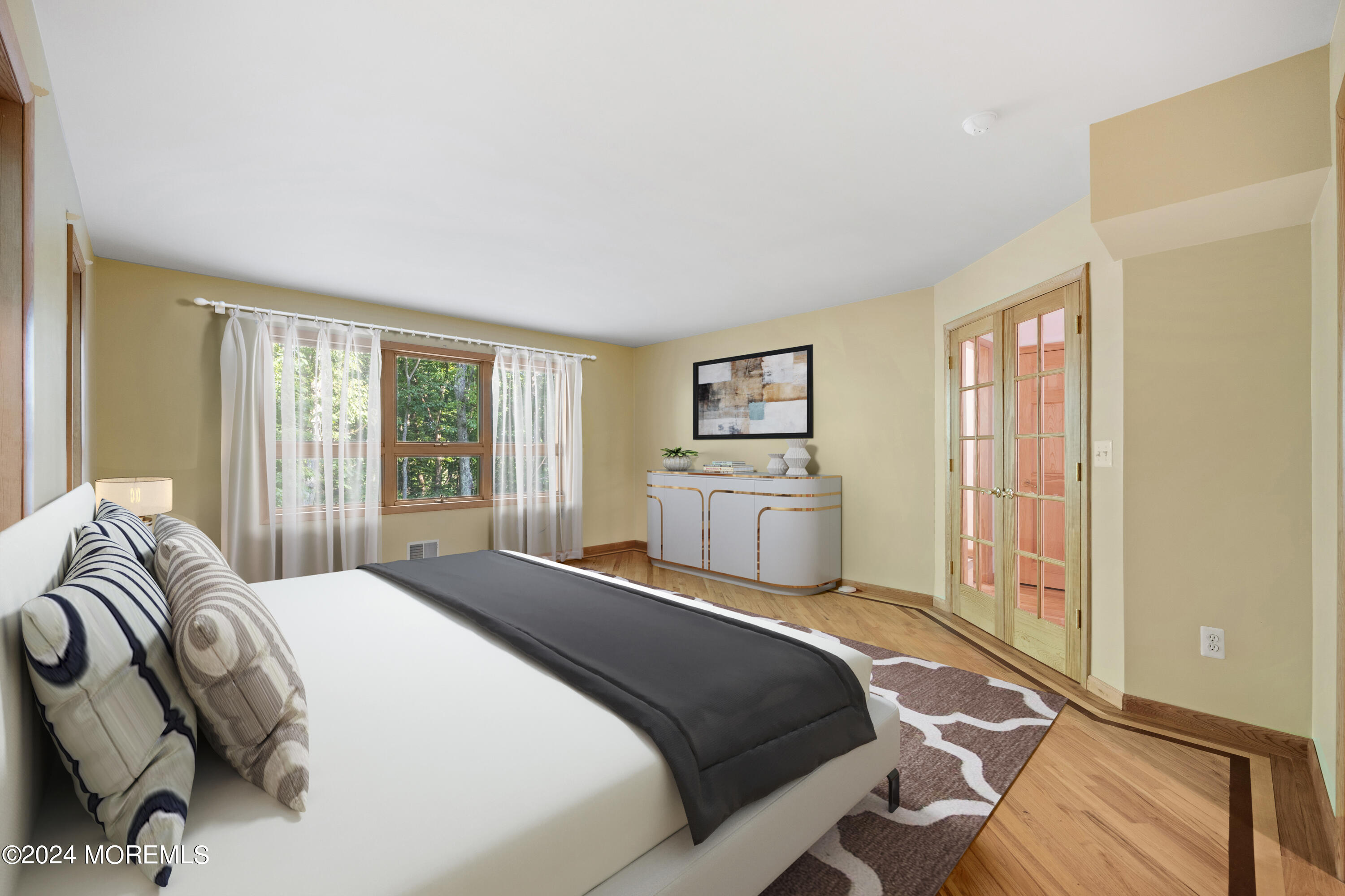 418 Stagecoach Road Millstone Township, NJ 08510 - Photo 14 of 43 a bedroom with a bed a large window and walk in closet