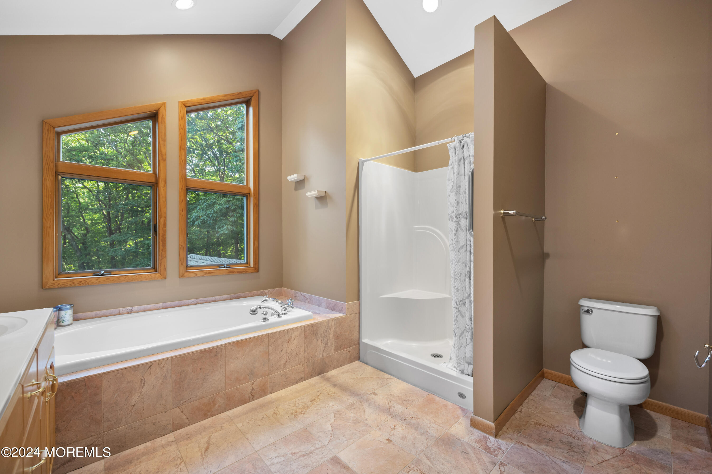 418 Stagecoach Road Millstone Township, NJ 08510 - Photo 20 of 43 a bathroom with a tub and a toilet