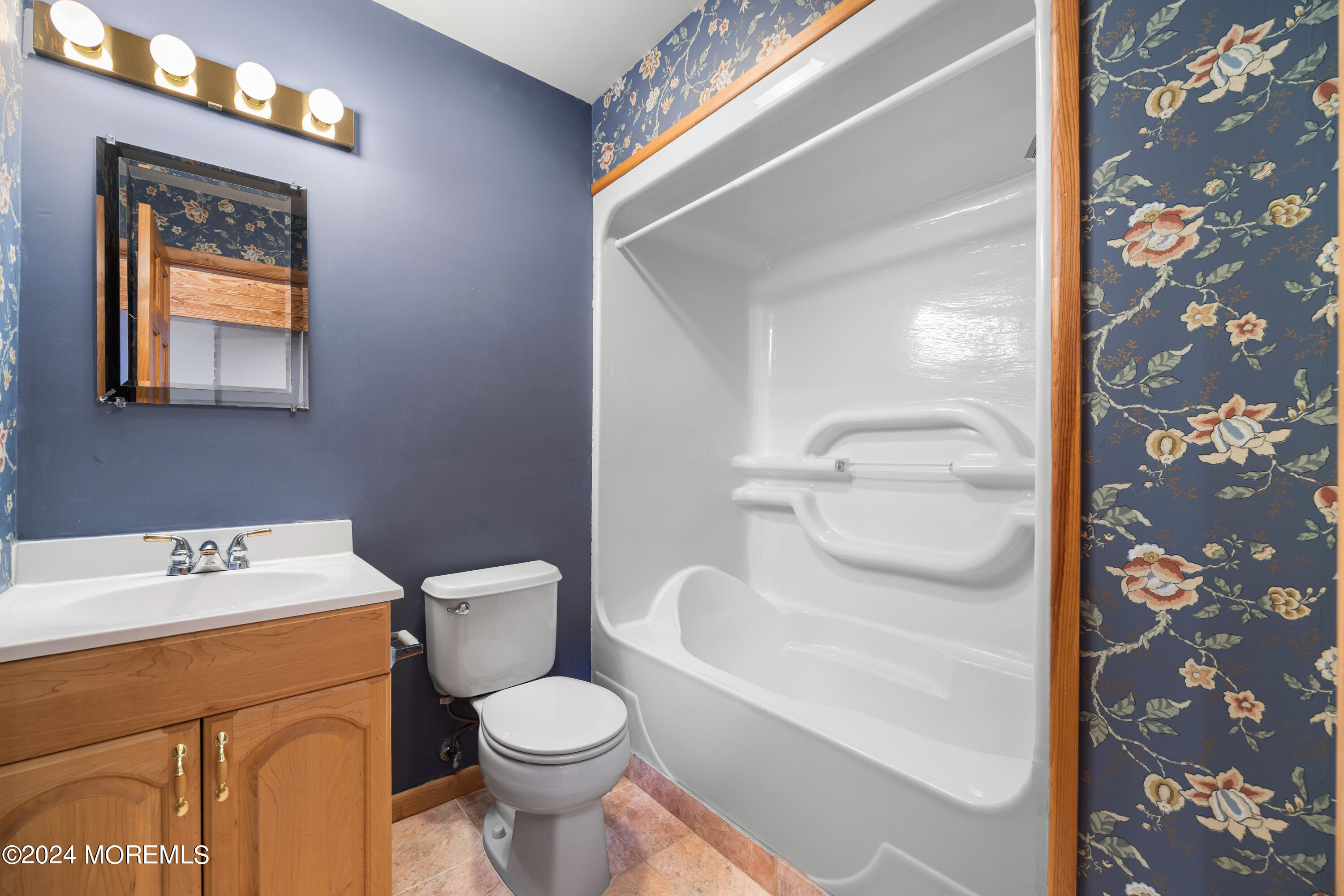 418 Stagecoach Road Millstone Township, NJ 08510 - Photo 21 of 43 a white toilet sitting next to a bathroom sink