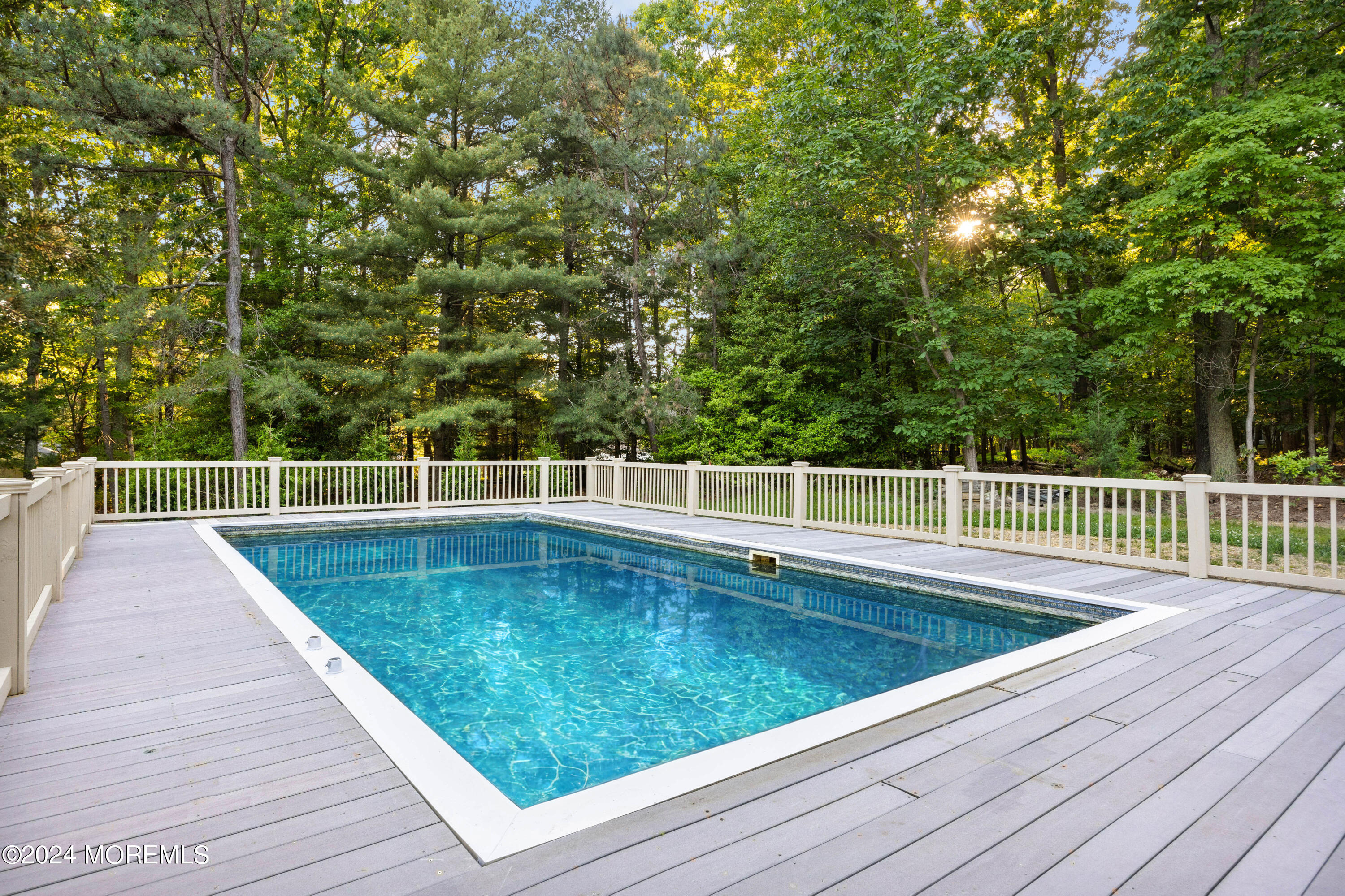 418 Stagecoach Road Millstone Township, NJ 08510 - Photo 30 of 43 a view of a swimming pool with a patio