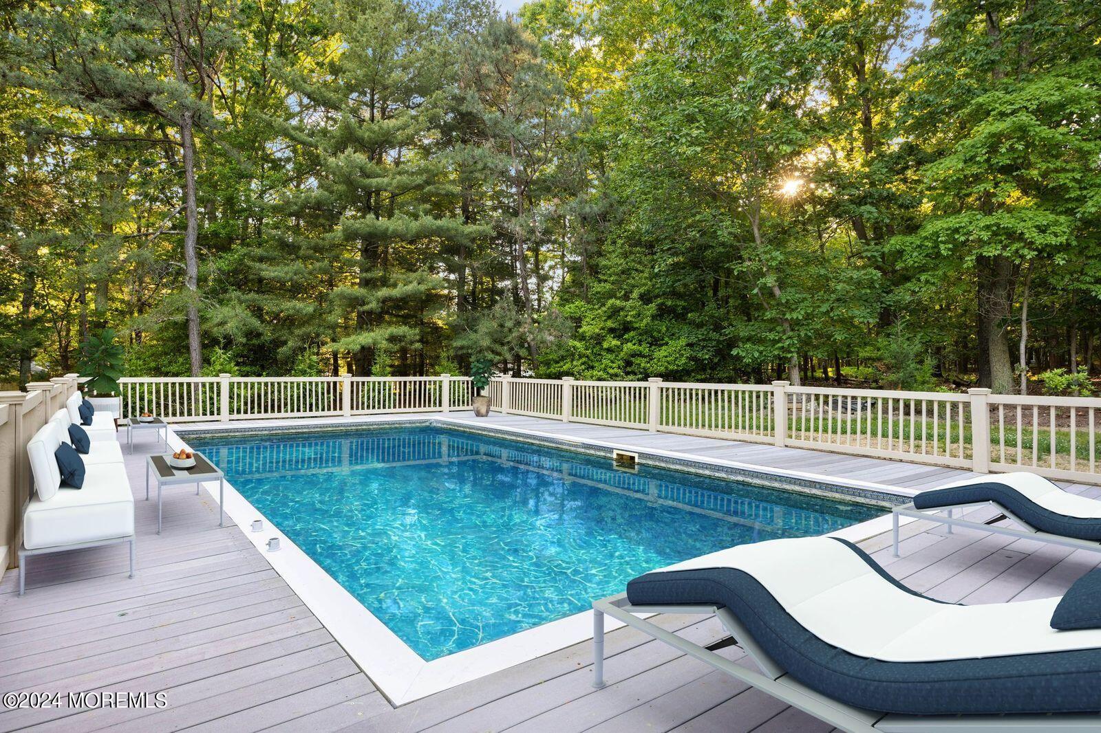 418 Stagecoach Road Millstone Township, NJ 08510 - Photo 3 of 43 swimming pool view with a seating space