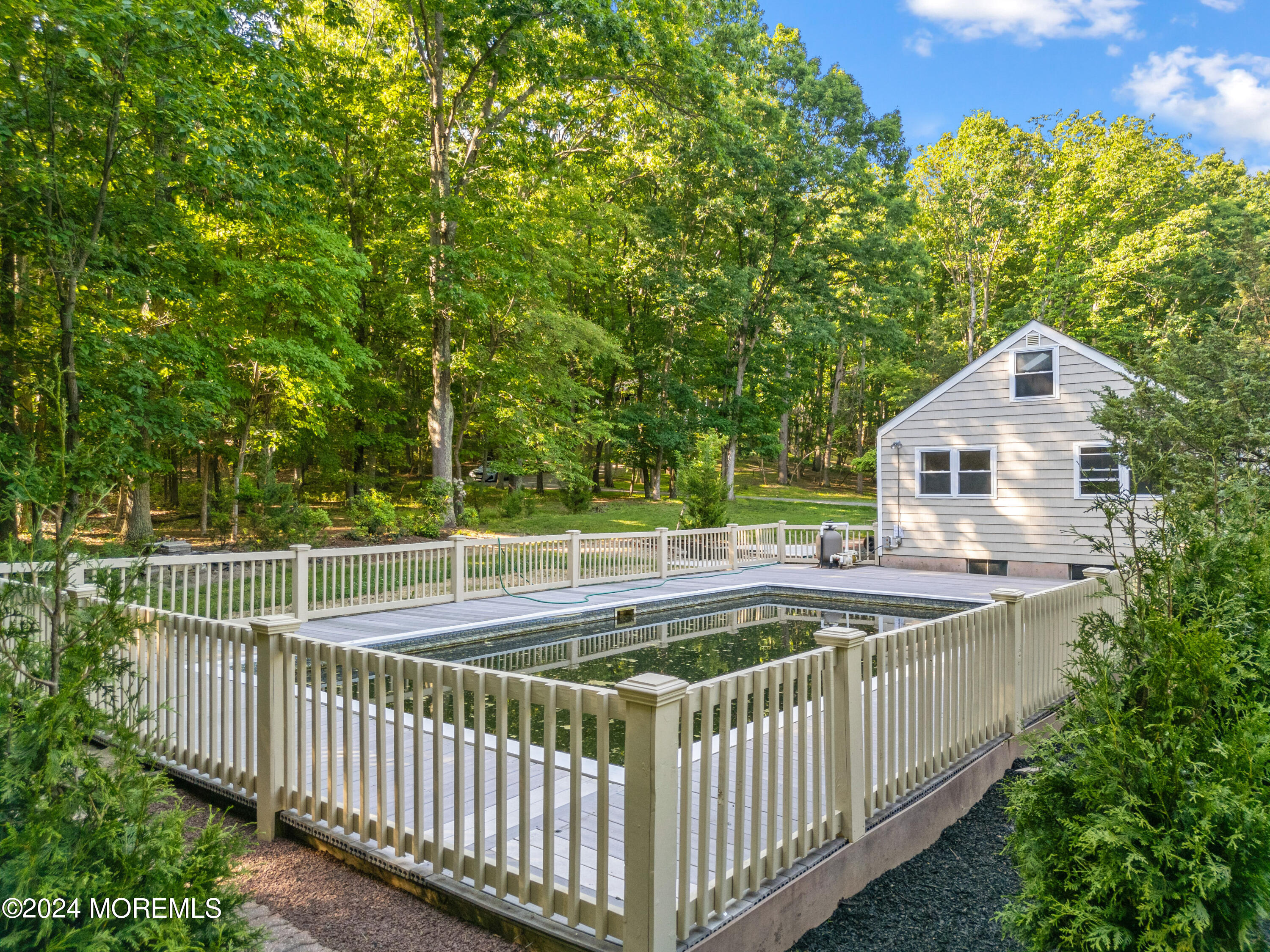 418 Stagecoach Road Millstone Township, NJ 08510 - Photo 31 of 43 a view of a house with wooden deck and a yard