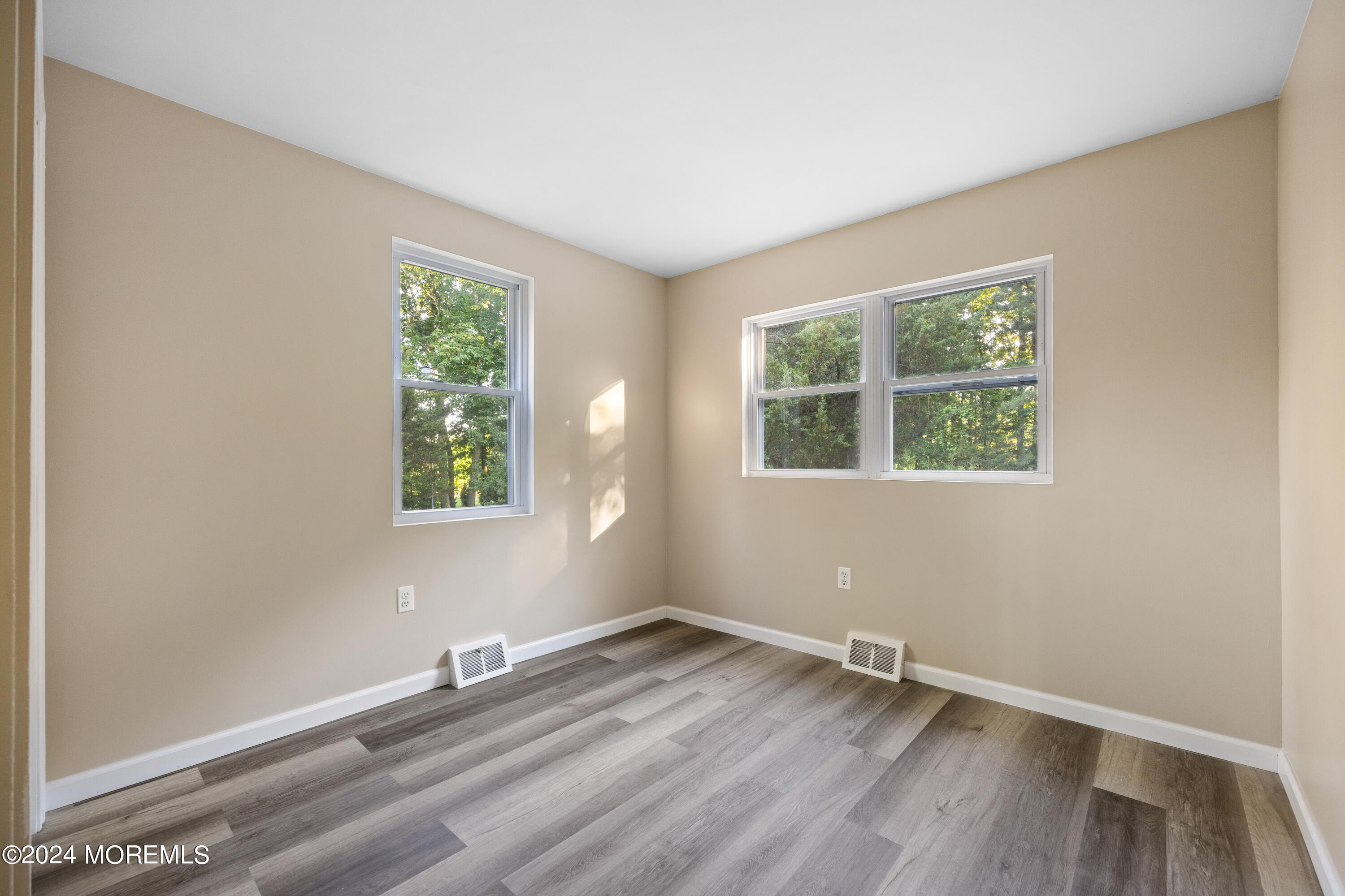 418 Stagecoach Road Millstone Township, NJ 08510 - Photo 33 of 43 an empty room with a window