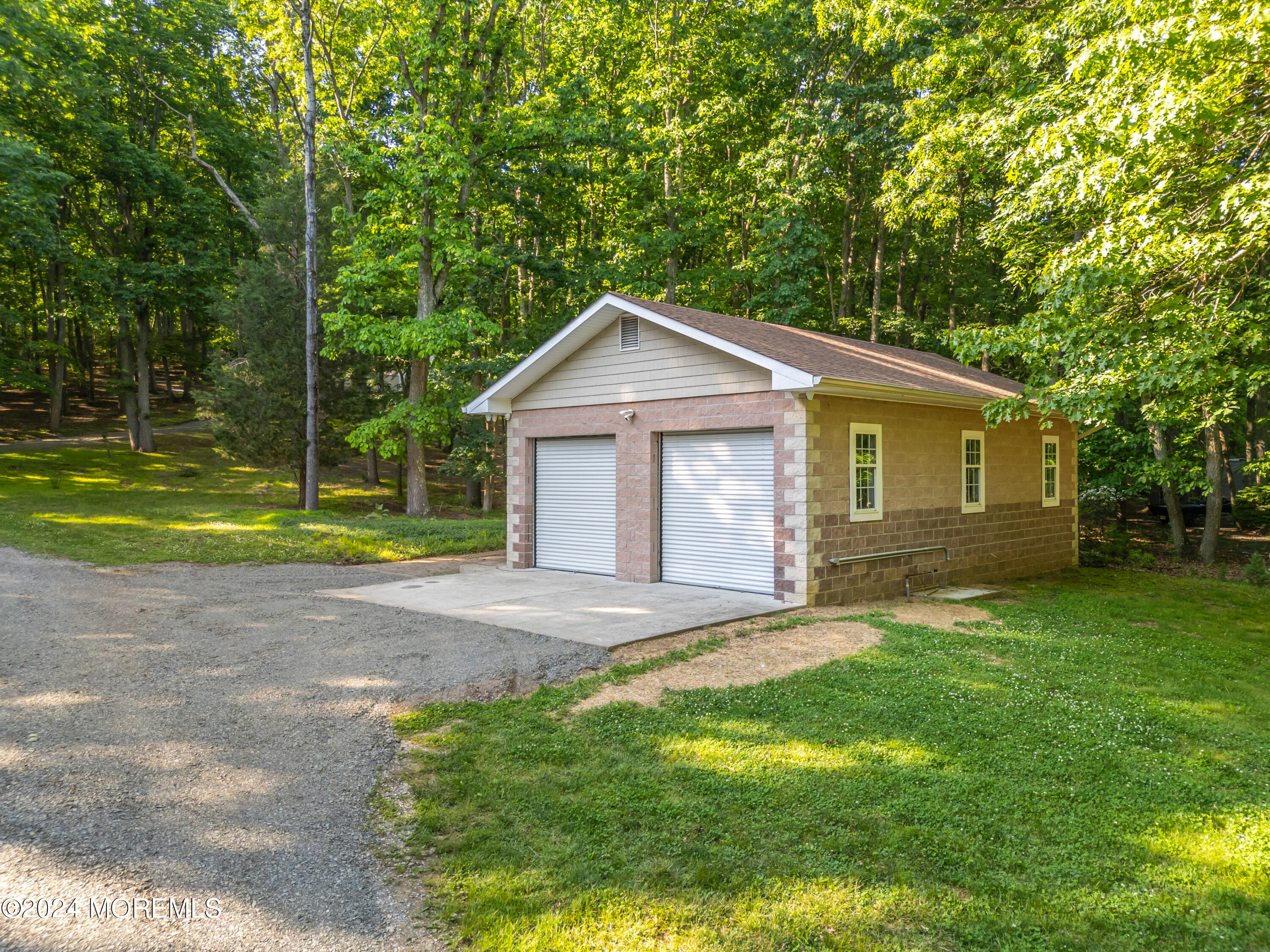418 Stagecoach Road Millstone Township, NJ 08510 - Photo 37 of 43 a front view of a house with a yard