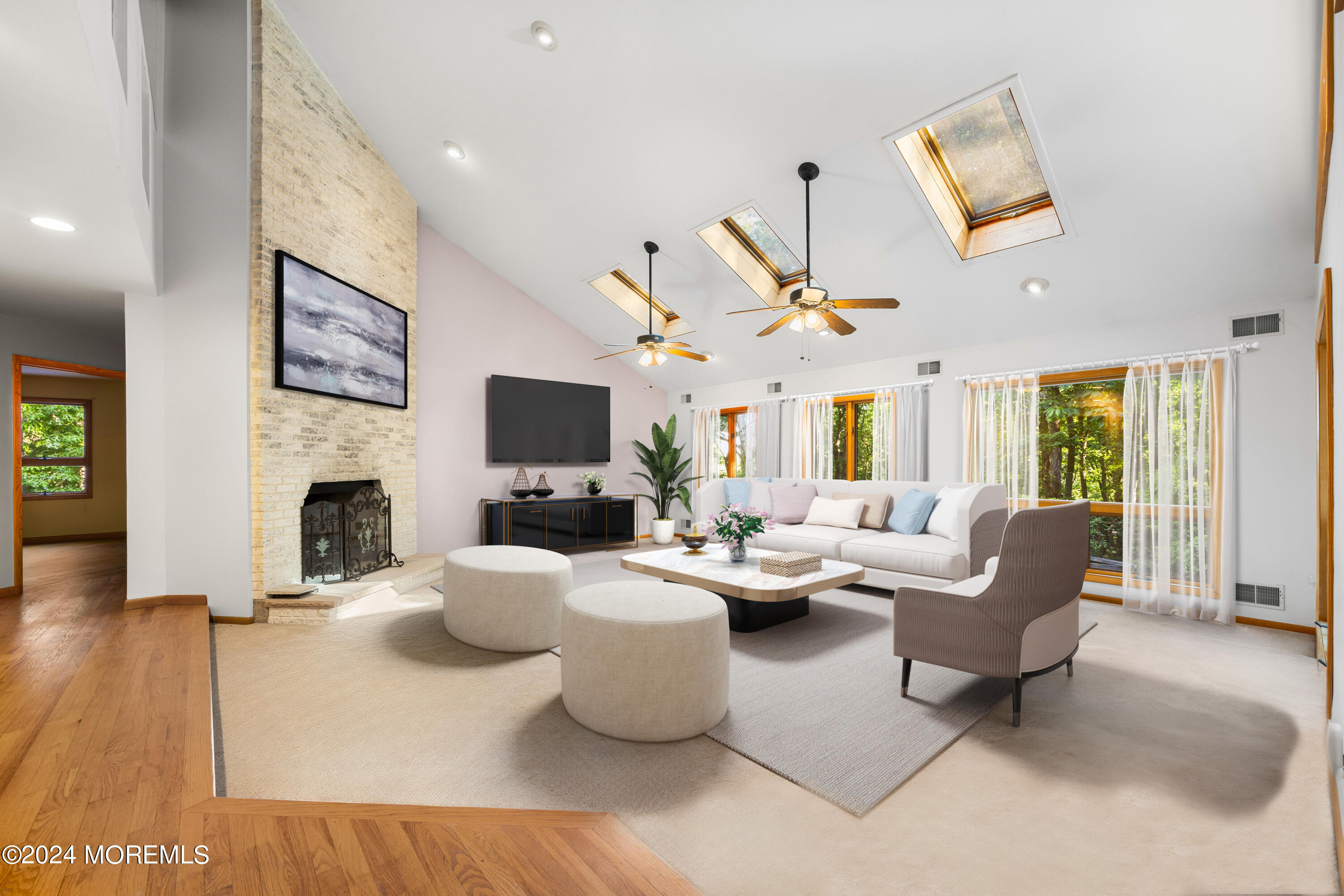 418 Stagecoach Road Millstone Township, NJ 08510 - Photo 4 of 43 a living room with fireplace furniture and a flat screen tv