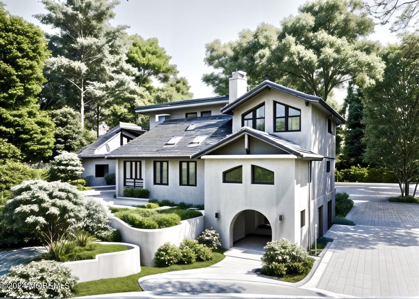 418 Stagecoach Road Millstone Township, NJ 08510 - Photo 42 of 43 a front view of a house with a yard and potted plants