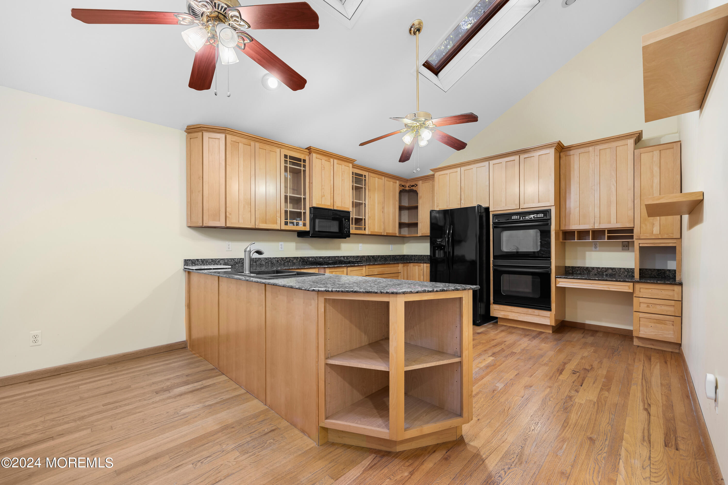 418 Stagecoach Road Millstone Township, NJ 08510 - Photo 8 of 43 a view of kitchen with sink microwave and refrigerator