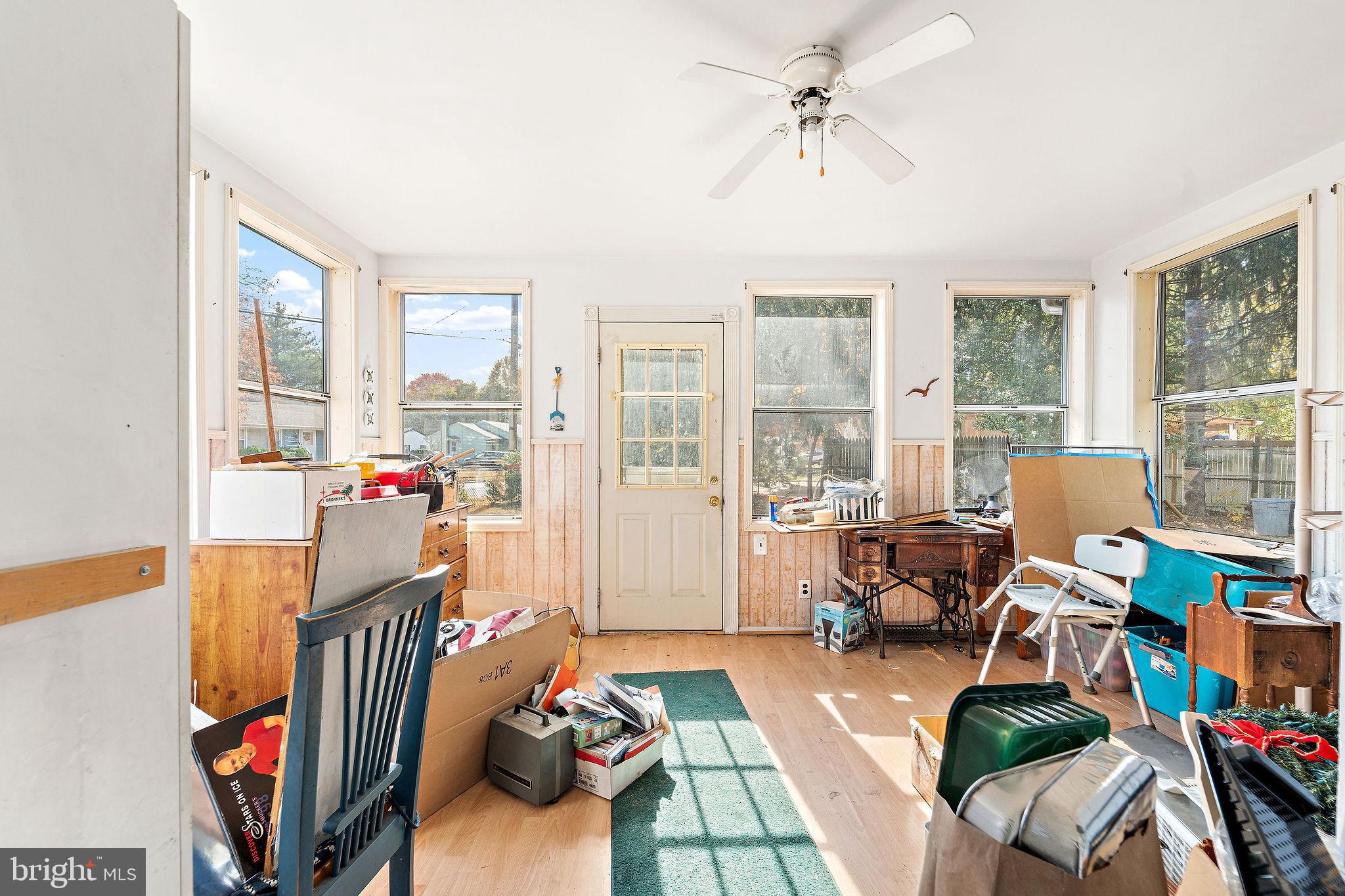 700 Elizabeth Avenue Lindenwold, NJ 08021 - Photo 12 of 29 a living room with furniture and a floor to ceiling window