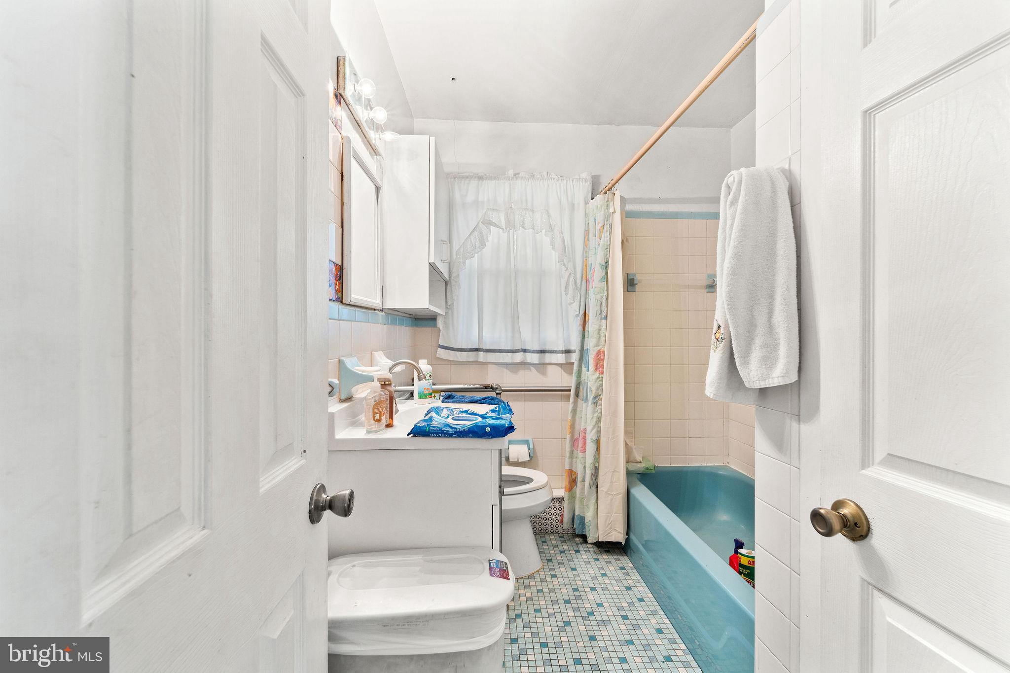 700 Elizabeth Avenue Lindenwold, NJ 08021 - Photo 9 of 29 a bathroom with a sink toilet and shower