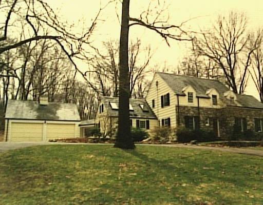 226 Woodbine Road Stamford, CT 06903 - Photo 1 of 1 a view of house with yard in front of it