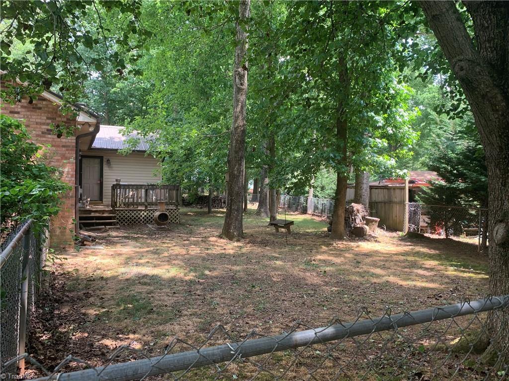 740 Burguss Road High Point, NC 27265 - Photo 28 of 34 wooded fenced yard
