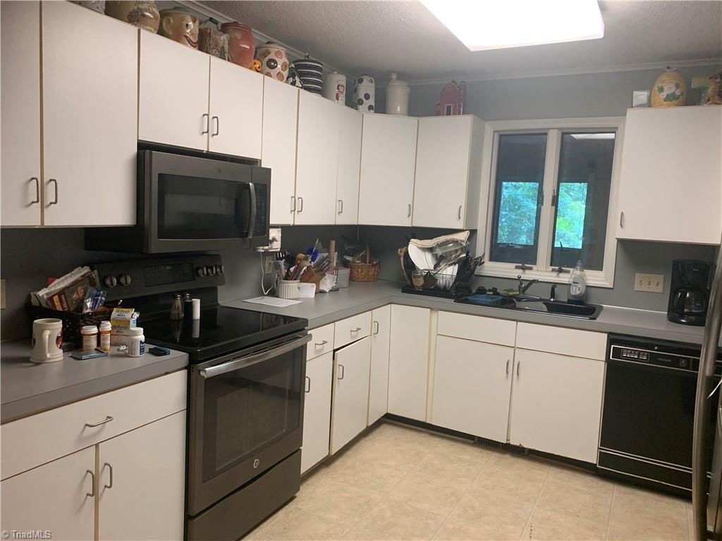 740 Burguss Road High Point, NC 27265 - Photo 8 of 34 large kitchen with new microwave, stove & dishwasher (ready to install)