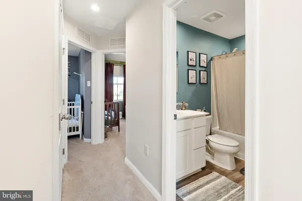 a bathroom with a toilet and a sink