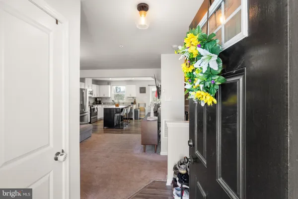 a view of a hallway with workspace