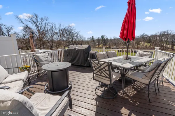 a view of a terrace with furniture