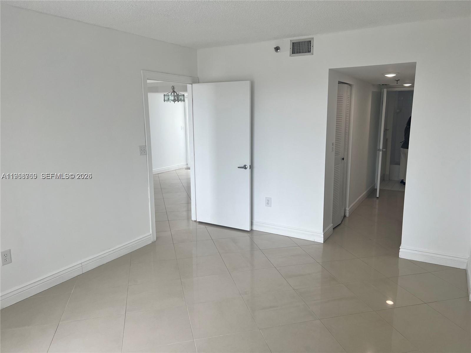 9156 Collins Avenue, Unit 204 Surfside, FL 33154 - Photo 12 of 17 a view of an empty room