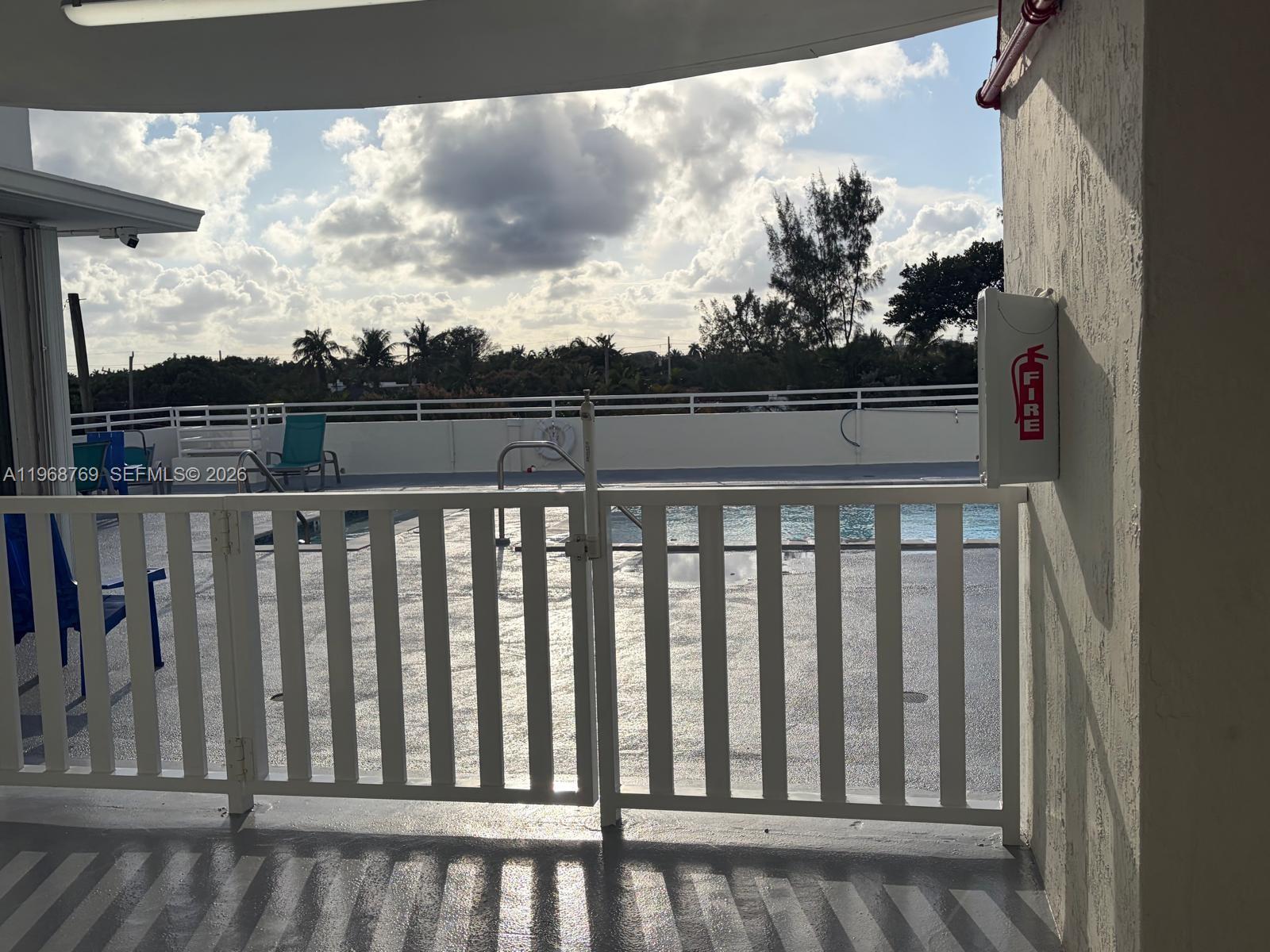 9156 Collins Avenue, Unit 204 Surfside, FL 33154 - Photo 14 of 17 a balcony with street view