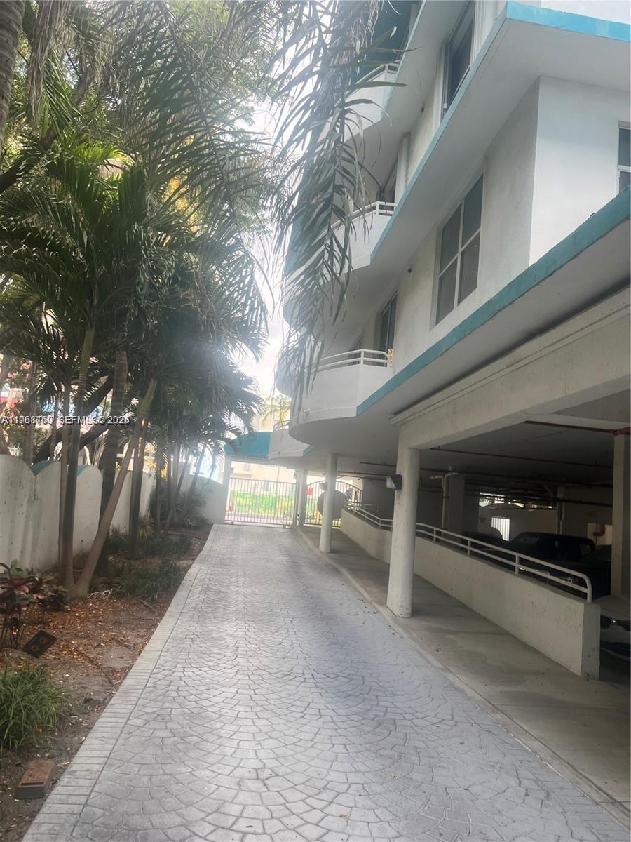 9156 Collins Avenue, Unit 204 Surfside, FL 33154 - Photo 3 of 17 a view of a car garage