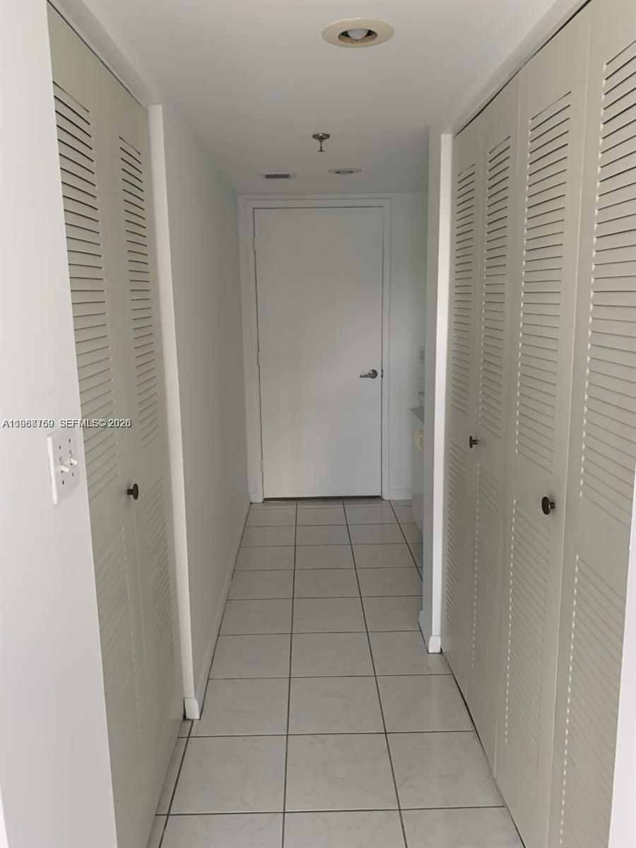 9156 Collins Avenue, Unit 204 Surfside, FL 33154 - Photo 8 of 17 a view of an empty room