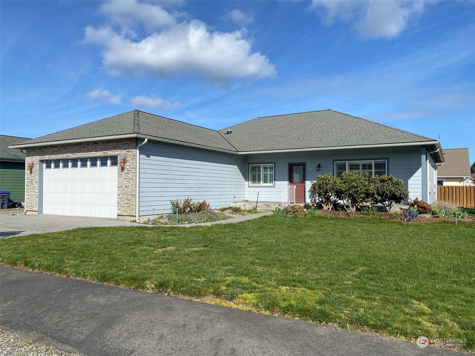 50 Nesting Place Sequim, WA 98382 - Photo 1 of 40 a front view of a house with a garden