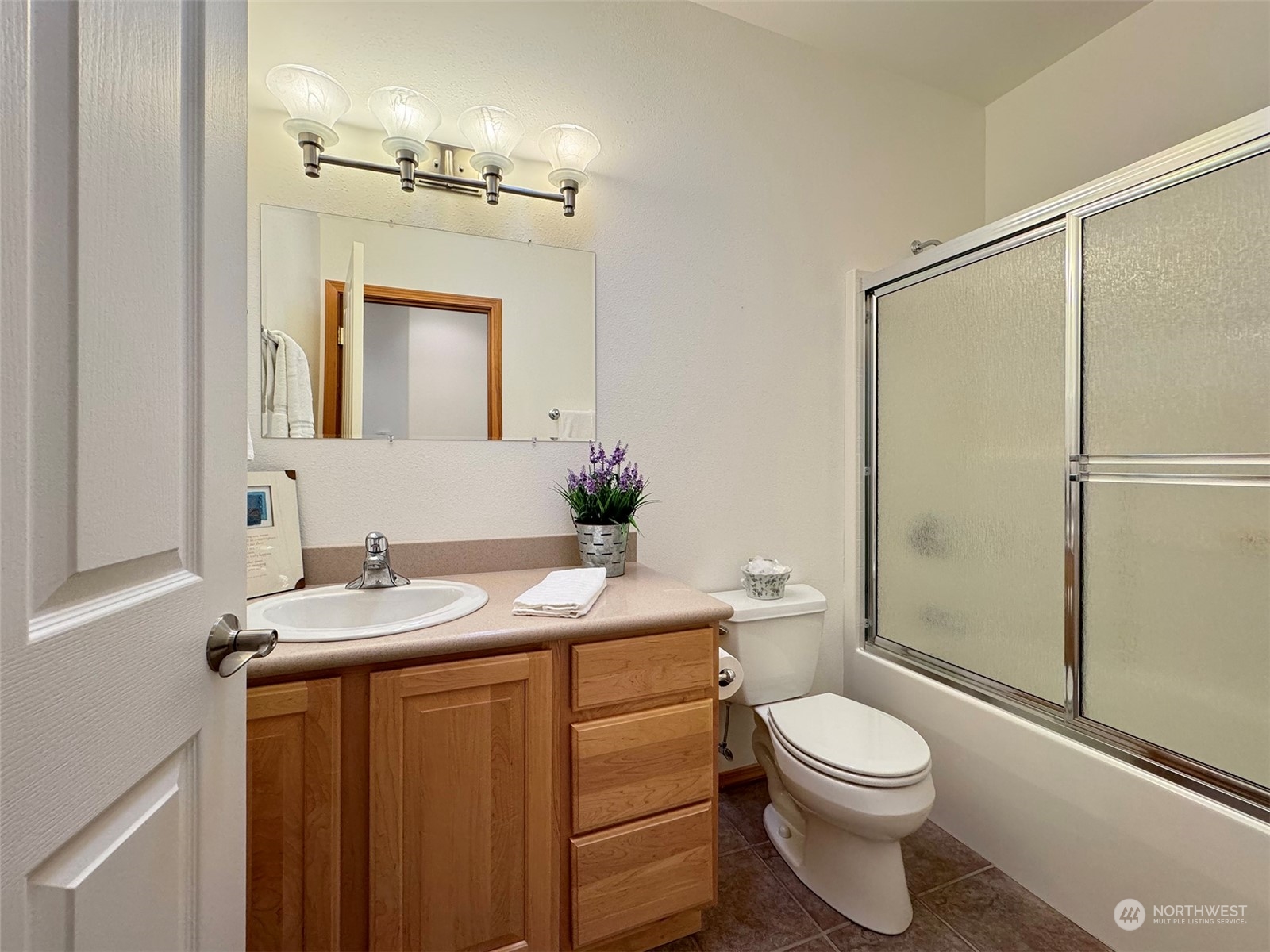 50 Nesting Place Sequim, WA 98382 - Photo 20 of 40 a bathroom with a sink a toilet and shower