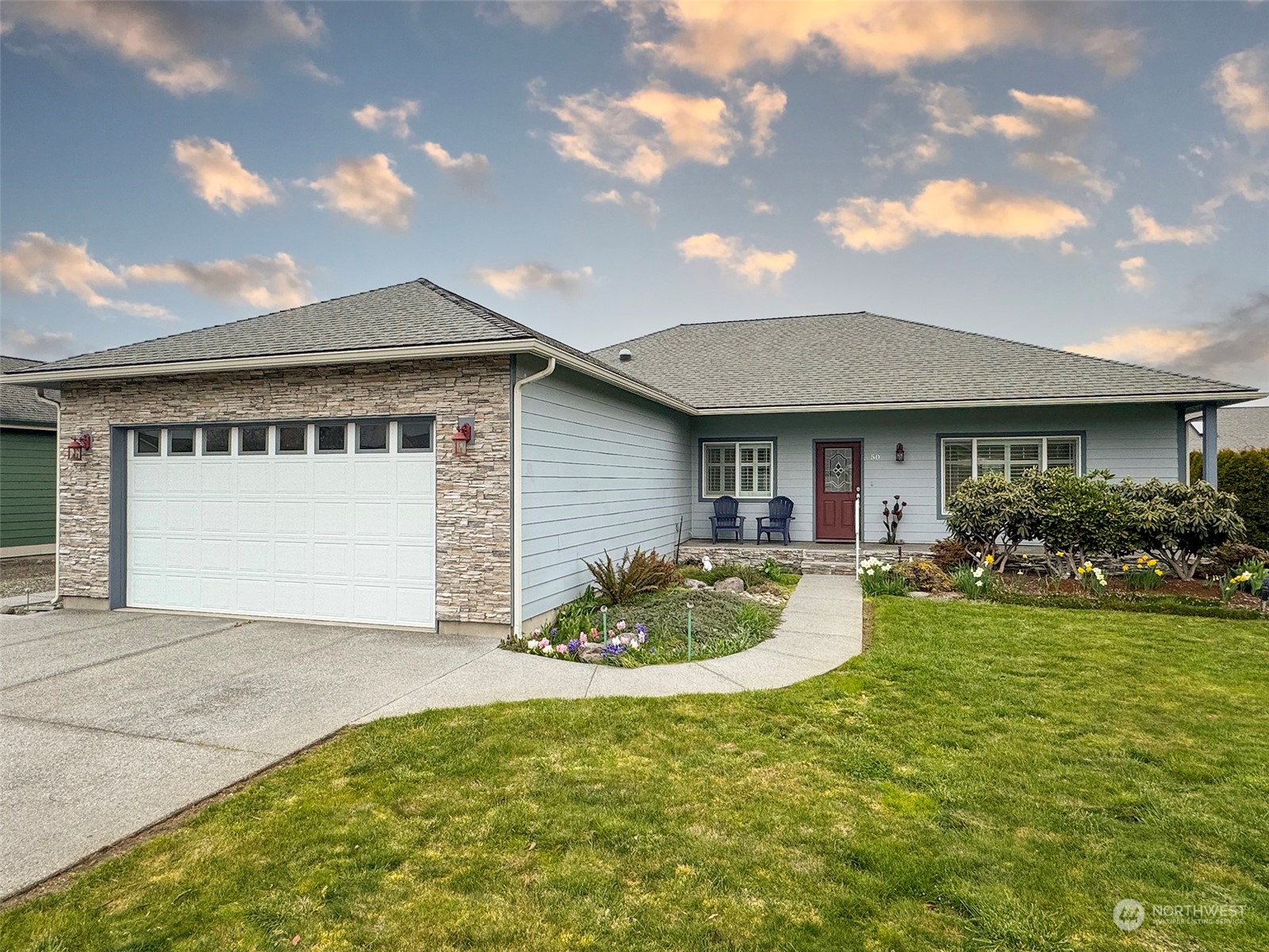 50 Nesting Place Sequim, WA 98382 - Photo 2 of 40 a view of a house with backyard and sitting area