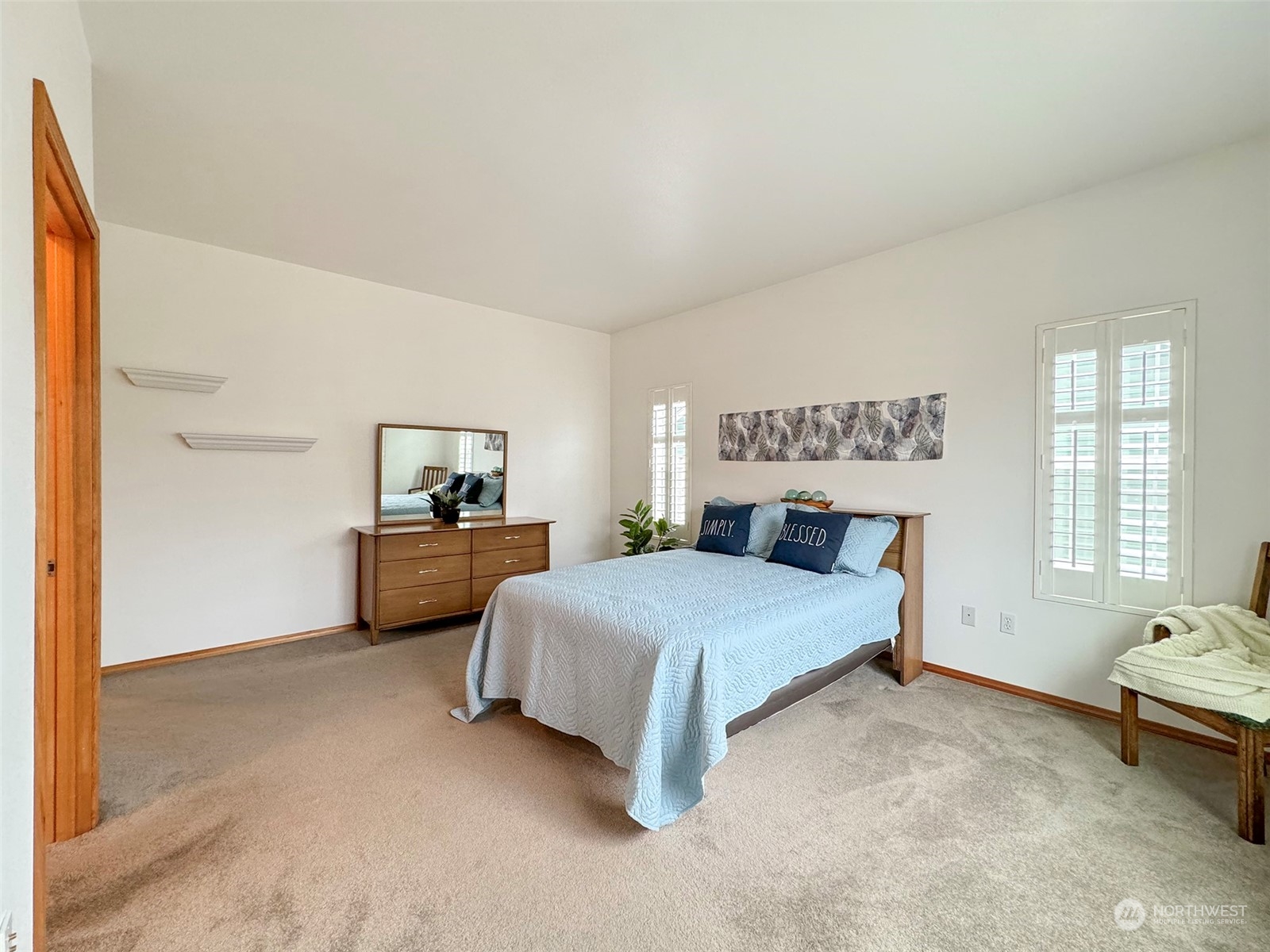 50 Nesting Place Sequim, WA 98382 - Photo 27 of 40 a spacious bedroom with a bed and a window