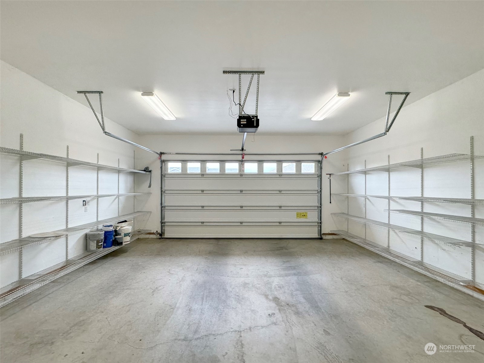 50 Nesting Place Sequim, WA 98382 - Photo 33 of 40 a view of room that has a garage
