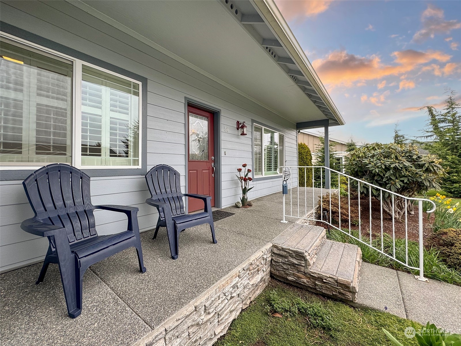 50 Nesting Place Sequim, WA 98382 - Photo 4 of 40 a balcony with furniture and a garden